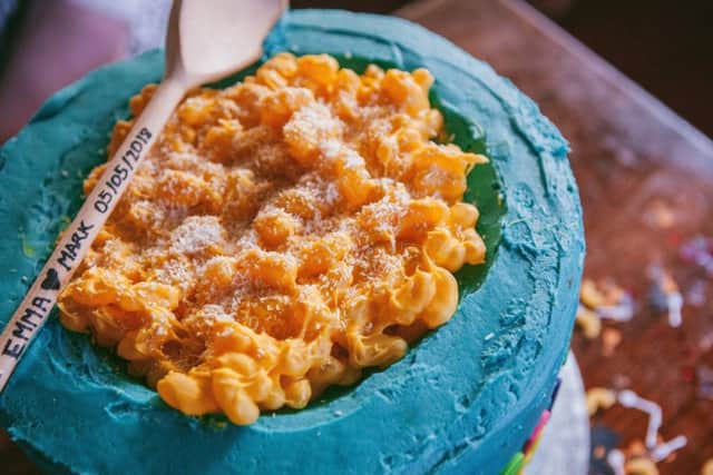 The guests enjoyed a "macaroni cheese cake" - which was carefully crafted from chocolate and jelly beans to resemble their favourite dish. Picture: SWNS