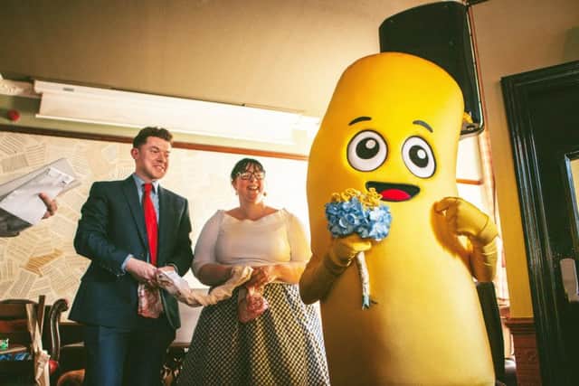 The newlyweds were joined by Mr Macaroni - the mascot for famous pasta specialists Marshalls. Picture: SWNS