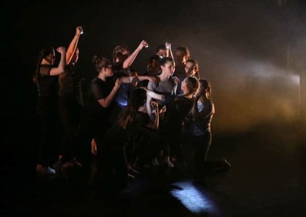 A mix of young companies and professionals put on a show inspired by riots