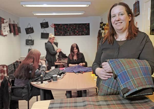 Amanda Moffet one of directors of The Kiltmakery with her team of kilt makers. Picture:
Neil Hanna