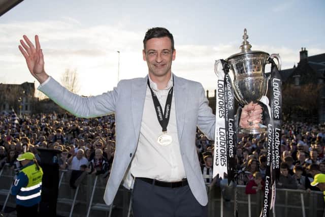 St Mirren manager Jack Ross with the Scottish Championship trophy. Picture: SNS Group