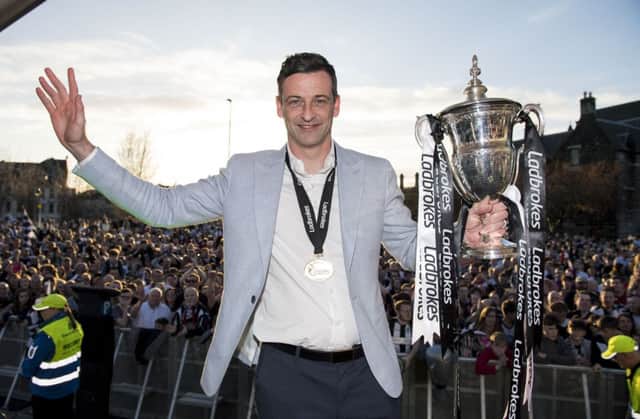 St Mirren manager Jack Ross with the Scottish Championship trophy. Picture: SNS Group