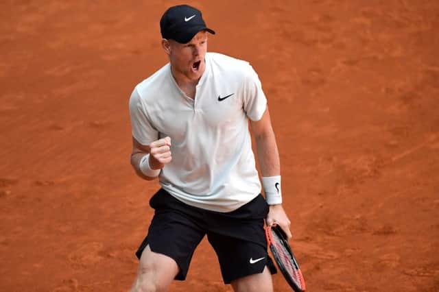 Kyle Edmund celebrates winning a point against David Goffin on his way to victory at the Madrid Open. Picture: AFP/Getty
