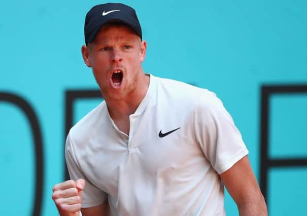 Kyle Edmund reacts after winning a point during his victory over world No 10 David Goffin in Madrid. Picture: Clive Brunskill/Getty Images