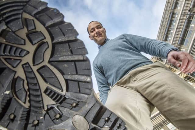 Dr Azmy Gowaid of Glasgow Caledonian University has developed a solar tile that could see pavements generate electricity.  Picture: Peter Devlin