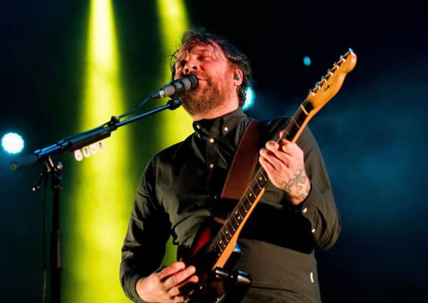 Scott Hutchison playing Princes Street Gardens with Frightened Rabbit on Hogmanay 2016. Picture: 
Ian Georgeson