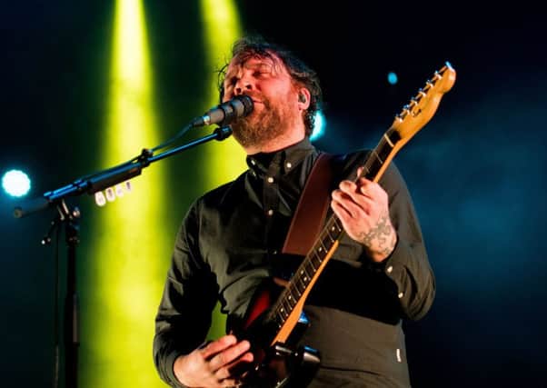 Scott Hutchison playing Princes Street Gardens with Frightened Rabbit on Hogmanay 2016. Picture:
Ian Georgeson