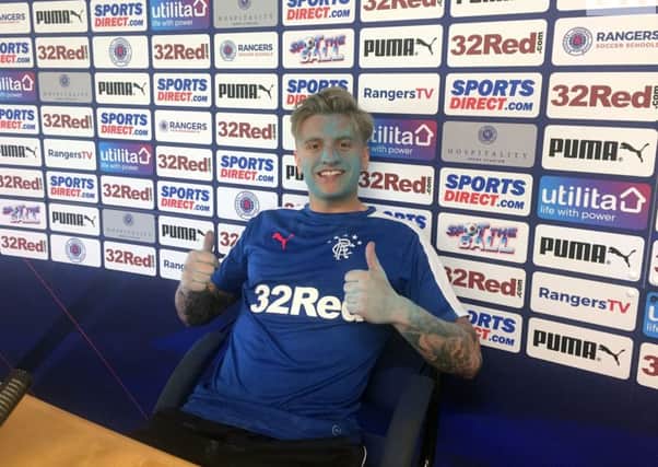 Rangers striker Jason Cummings promotes the Rangers Charity Foundation Blue All Over fun run. Picture: Martin Rickett/PA Wire