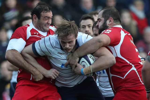 Scotland's Jonny Gray takes on two of Georgia's formidable forwards at Rugby Park in Kilmarnock in 2016. Picture: Ian MacNicol/Getty Images