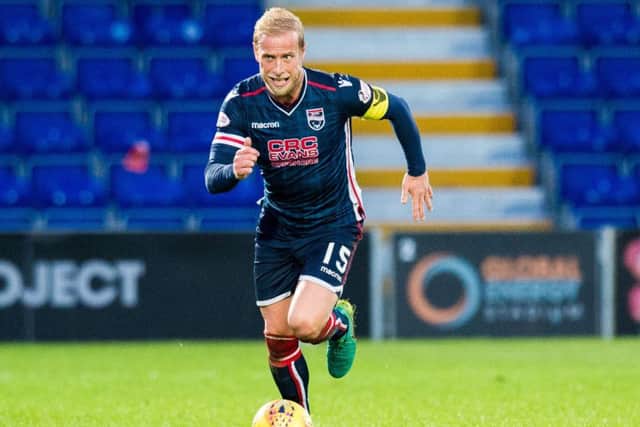 Andrew Davies is convinced there is still enough fight in the Ross County team to avoid relegation. Picture: SNS.