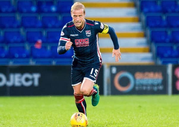 Andrew Davies is convinced there is still enough fight in the Ross County team to avoid relegation. Picture: SNS.