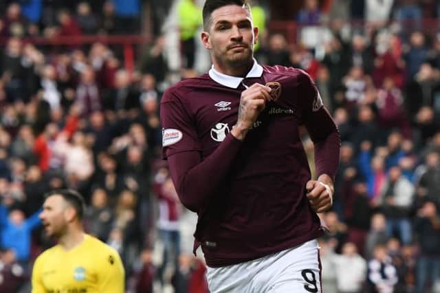 Hearts' Kyle Lafferty scored his 19th goal of the season against Hibs but later injured his shoulder. Picture: Craig Williamson/SNS