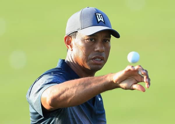 Tiger Woods carded two birdies and one bogey in a second round of 71 yesterday to end the day one under par. Picture: Getty.