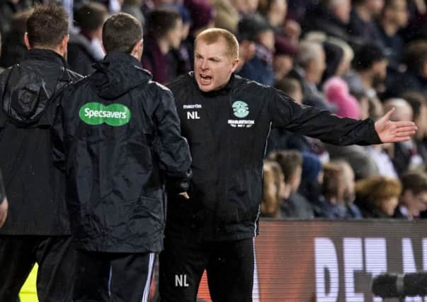 Many Hibs supporters have bought season tickets on the proviso that Neil Lennon will be in the dugout next season. Picture: Craig Williamson/SNS