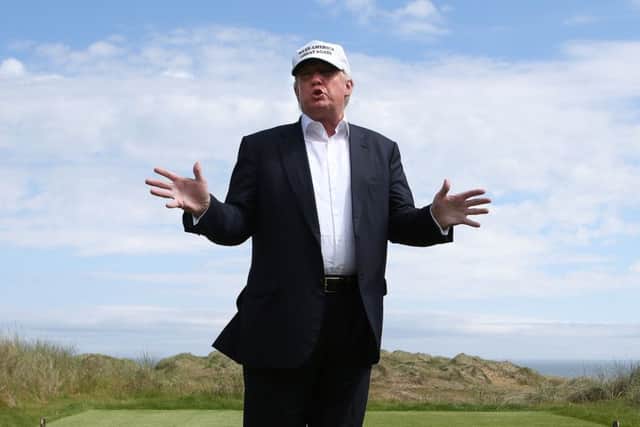 Donald Trump chats with the media whilst on a tour of  Trump International Golf Links at Balmedie in 2016. Picture: Andrew Milligan/PA Wire