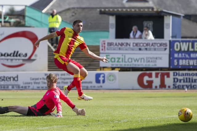 Partick Thistle's Kris Doolan scores a crucial goal to defeat Dundee. Picture: SNS/Bruce White