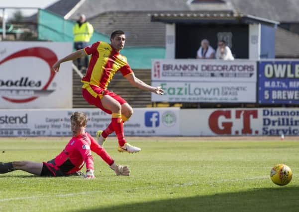 Partick Thistle's Kris Doolan scores a crucial goal to defeat Dundee. Picture: SNS/Bruce White