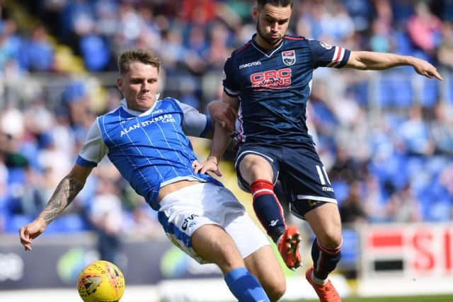 St Johnstone's Jason Kerr puts Ross County's Alex Schalk under pressure. Picture: SNS/Craig Williamson