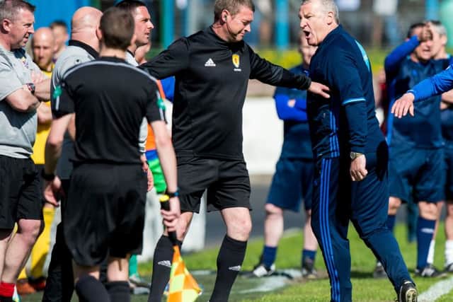 Cowdenbeath manager Gary Bollan and Cove Rangers manager John Sheran, right, clash before they're both sent off. Picture: Ross Parker/SNS