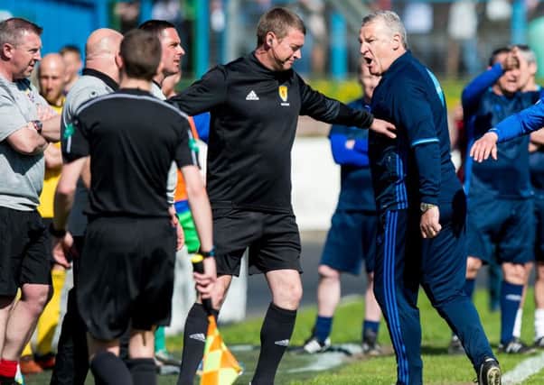 Cowdenbeath manager Gary Bollan and Cove Rangers manager John Sheran, right, clash before they're both sent off. Picture: Ross Parker/SNS