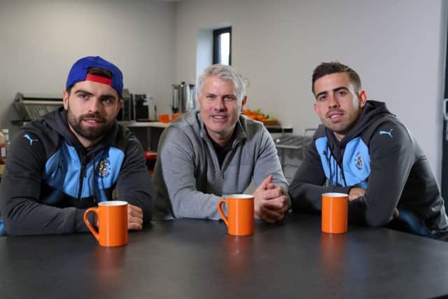 Olly Lee (R) with his brother Elliot and dad Rob. Picture: Catherine Ivill/Getty Images