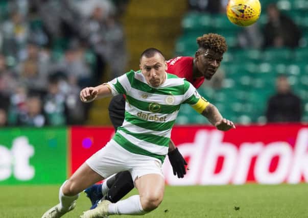Scott Brown battles for possession during the recent 0-0 draw with Kilmarnock. Picture: SNS