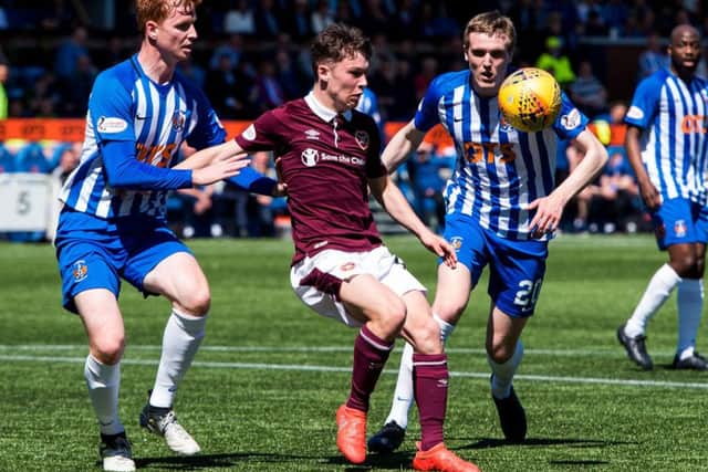 Anthony McDonald competes with Kilmarnock defender Scott Boyd. Picture: SNS