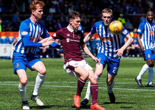 Anthony McDonald competes with Kilmarnock defender Scott Boyd. Picture: SNS