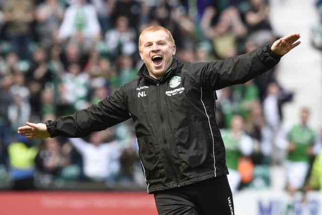 Neil Lennon celebrates Jamie Maclarens equaliser in stoppage time before being sent off at Easter Road yesterday. Picture: PA.