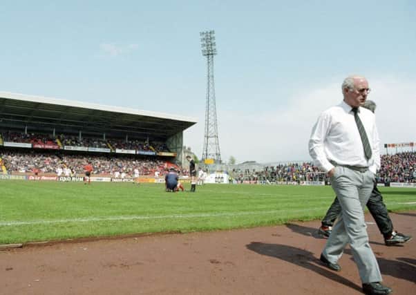 Jim McLean returns to his seat in the dugout as Dundee United lose 4-1 to Aberdeen  in 1993  - his last game in charge of the Tannadice club.