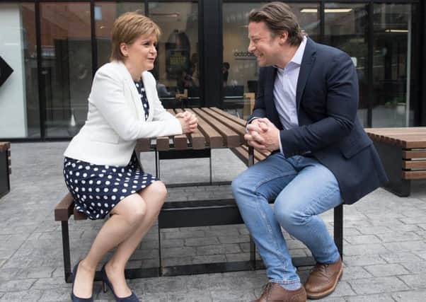 Jamie Oliver meets First Minister Nicola Sturgeon in London as she announces new measures to tackle childhood obesity (Picture: PA)