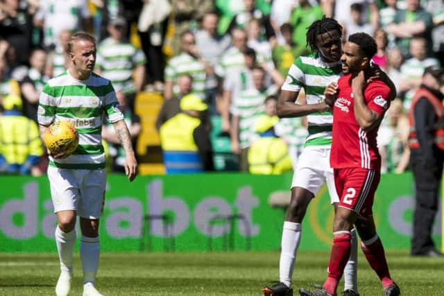 Leigh Griffiths, left, and Dedryck Boyata were both guilty of throwing the ball at Aberdeen's Shay Logan. Picture: SNS