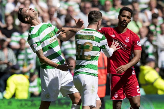 Shay Logan was guilty of shoving Mikael Lustig, left, in the face. Picture: SNS