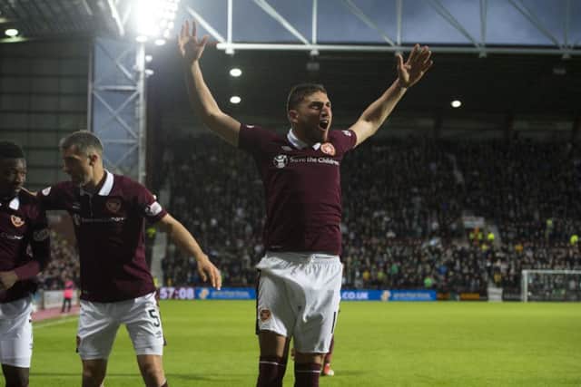 David Milinkovic celebrates after Steven Naismith scores the winning goal in last week's Edinburgh derby. Picture: SNS
