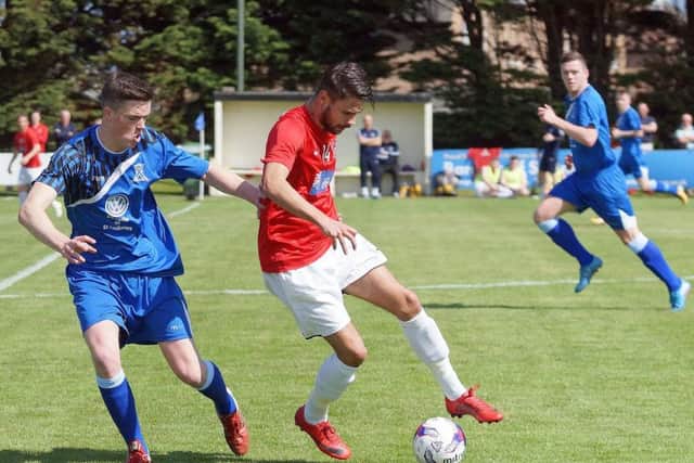 Tayport's Dayle Robertson in action during the weekend's derby win. Pic by George Wallace.