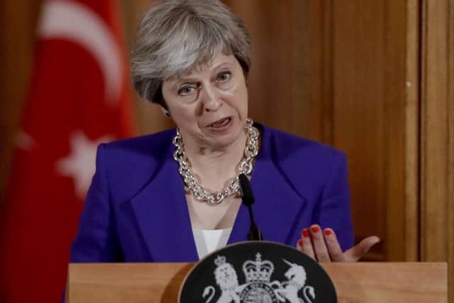 During briefings for Conservative MPs in Downing Street, the Prime Minister was reportedly challenged by Brexiteer Jacob Rees-Mogg over her unwillingness to impose some border infrastructure in Northern Ireland. Picture: AP Photo/Matt Dunham, Pool