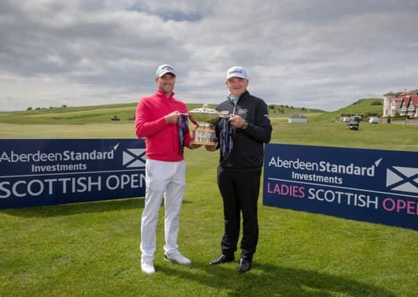Marc Warren and Paul Lawrie with the Scottish Open Trophy at Gullane. Picture: Kenny Smith.