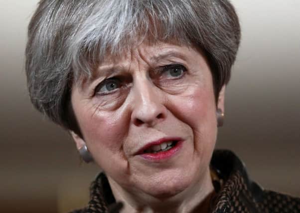Theresa May's faltering speech and robotic repetition of slogans isn't helping the national mood (Picture: Getty)