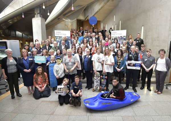 Celebration of the success of the Bags of Help scheme from Tesco and greenspace scotland at the Scottish Parliament