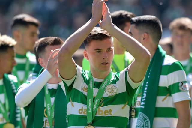 Kieran Tierney celebrates at Celtic Park on Sunday after the players received their medals for the club's seventh title in a row. Picture: Getty Images