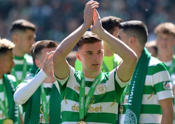 Kieran Tierney celebrates at Celtic Park on Sunday after the players received their medals for the club's seventh title in a row. Picture: Getty Images