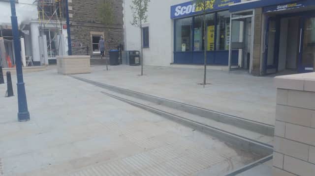 The pavement outside Selkirk's Scotbet shop, which Cath Henderson says is being ruined by bikers.