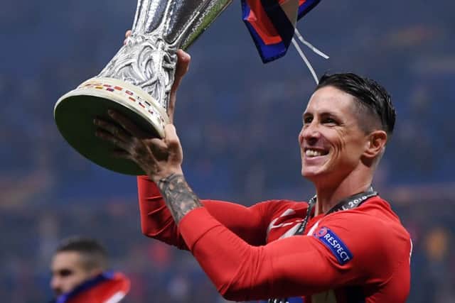 Fernando Torres celebrates winning the Europa League with Atletico Madrid on Wednesday night. Picture: Getty