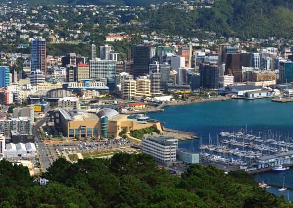 New Zealand, whose capital Wellington is seen here, spends much less on health and welfare than Scotland