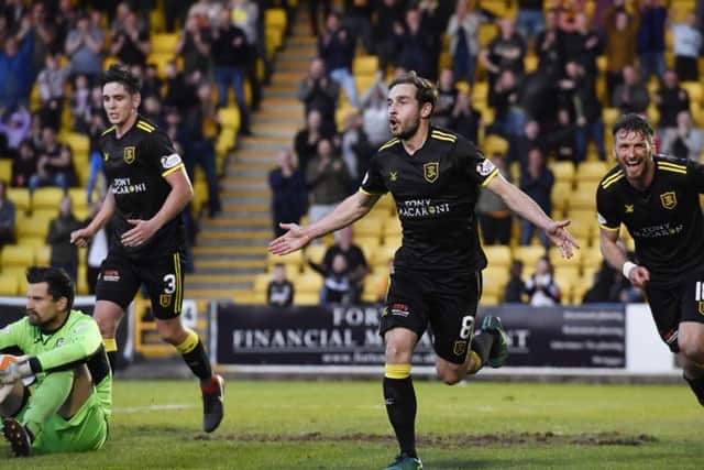 Scott Pittman celebrates after putting Livingston 2-1 ahead. Picture: SNS