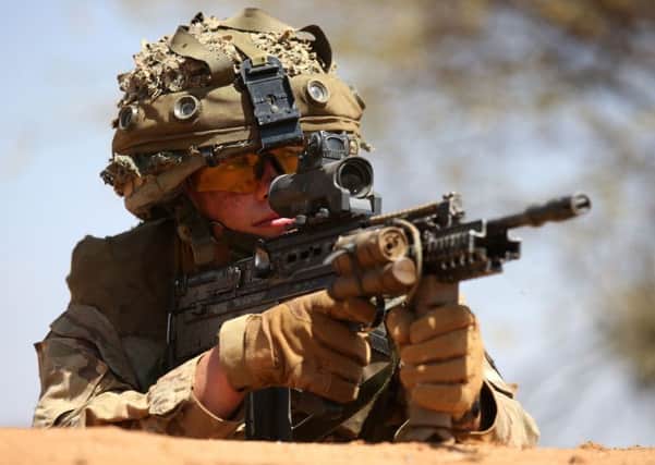 A soldier from The Royal Regiment of Scotland(2SCOTS) during a live firing exercise. Picture: Andrew Milligan/PA Wire