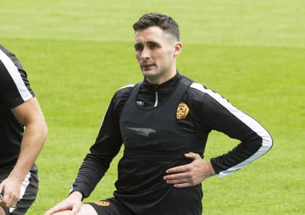 Motherwell skipper Carl McHugh vows his side will play their usual physical game against Celtic. Picture: SNS.