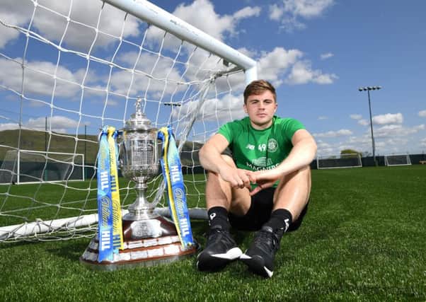 James Forrest with the William Hill Scottish Cup at the Celtic training ground. Picture: Craig Williamson/SNS