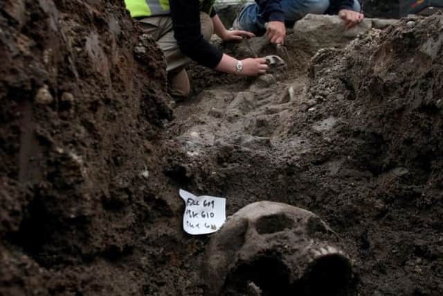 Archaeologists work on the site of the Carmelite Friary of Tullilum, on the edge of Perth. Picture: SWNS