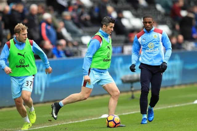 Scott Arfield says Joey Barton, centre, praised the Ibrox set-up. Picture: PA.